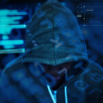 Hacker with their hood up